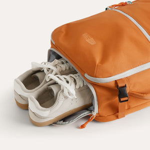 large_travel_backpack_rust_with_shoe_compartment