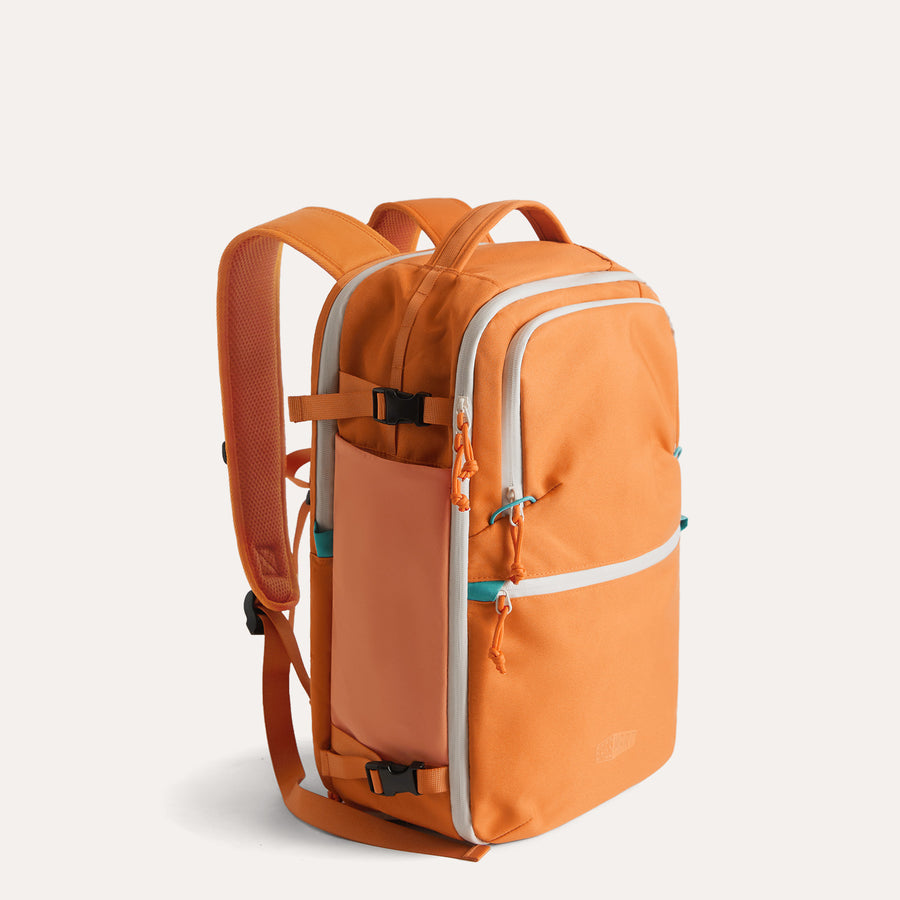 womens_travel_backpack_multiples_pockets_rust